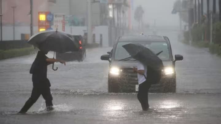 Powerful Typhoon Hits Japan as Torrential Rain Triggers Deadly Landslides