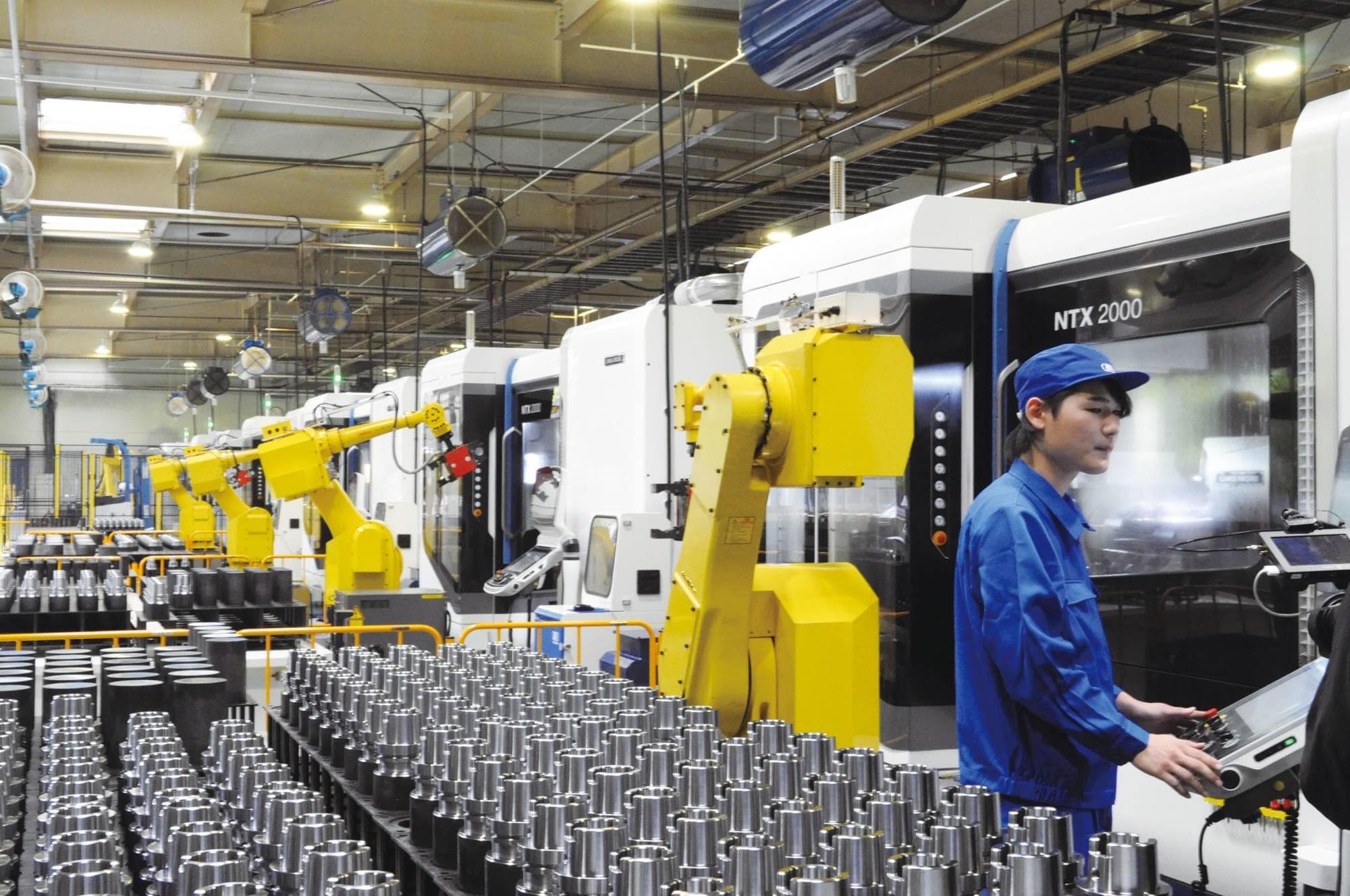 Japan's Manufacturing Expansion Slows to Seven-Month Low as Demand Moderates